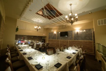 Alternative angle of room featuring U shape table