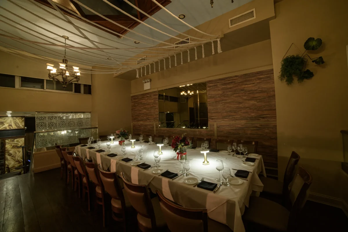 Additional angle of room with rectangular table